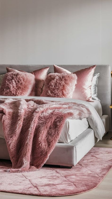 Modern bedroom featuring millennial pink throw pillows, a blush pink rug, and minimalist decor with soft gray walls and gold accents. Pink Velvet Bedroom Ideas, Dusty Pink Bedroom, Bedroom Accents, Velvet Bedroom, Millennial Pink, Pink Bedrooms, Bedroom Accent, Blush Tones, Contemporary Chic