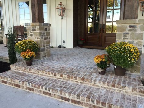 Farmhouse style brick front porch.   Slab home to look pier and beam Brick Porch Steps Entrance, Brick Foundation Farmhouse, Sidewalks To Front Door From Driveway Entrance, Brick Steps Front Porch Farmhouse, Brick Porches Ideas Entrance, Front Porch Brick Pavers, Brick Stairs Front Porch, Pavers On Front Porch, Farmhouse With Brick Skirt