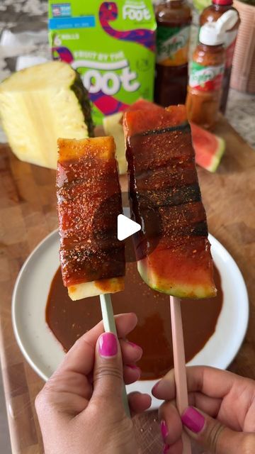 Samiya Jakubowicz on Instagram: "Watermelon + Pineapple-Mexican Snack Style 🔥 Had to make this again but tried pineapple too…  BANGERS 🕺🍉🍍  Sliced, wrapped in a fruit rollup, dipped in Chamoy, sprinkled with Tajin.  Its so JUICY, sweet, spicy, sour  My summer guilty pleasure   #watermelon🍉 #pineapples #mexicansnacks #chamoy #tajín #mexicanfruit #summersnacks #fruitrollup #chamoydip #fruitsnack" Watermelon Wrapped In Fruit Roll Up, Watermelon Fruit Roll Up Chamoy, Chamoy And Tajin Fruit, Chamoy Recipe Ideas, Pineapple Tajin, Watermelon Tajin, Tajin Fruit, Watermelon Chamoy, Mexican Watermelon