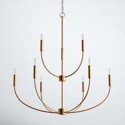 The light chandelier is contemporary and uber-minimalistic. Visual interest is created using a mix of rectangular and round frames, a subtle design detail. Although this collection is contemporary, it can be mixed in with a variety of collections with ease. Finish: Satin Brass | Joss & Main Kendrey Nine Light Chandelier 34.0 H x 32.0 W x 32.0 D in pink / yellowMetal in Satin Brass | 34" H X 32" W X 32" D | Wayfair Classic Chandelier, Chandelier Metal, Classic Candles, Foyer Lighting, Wagon Wheel Chandelier, Candle Style Chandelier, Traditional Chandelier, Drum Chandelier, Candle Styling