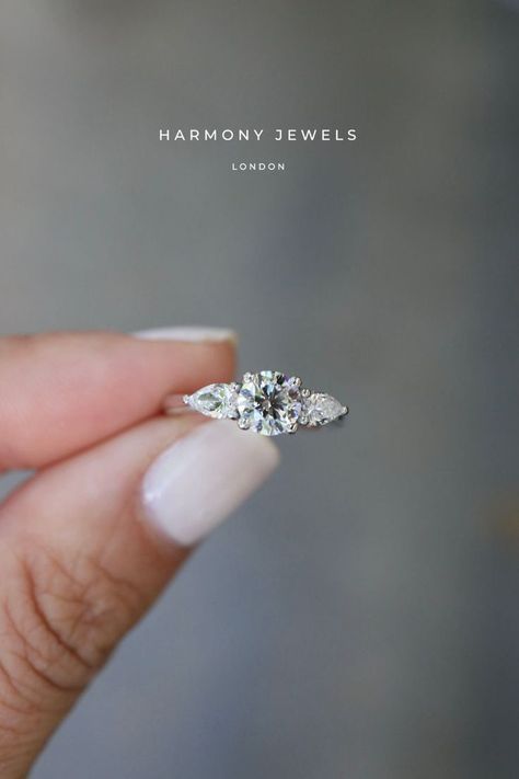 Pear Sidestone Engagement Ring, Round Diamond Side Stones, Round Diamond Engagement Rings With Side Stones, Engagement Ring Accent Stones, Trilogy Diamond Engagement Ring, Trilogy Engagement Ring Silver, 3 Stone Engagement Rings Silver, Three Stone Wedding Rings, Round Engagement Rings With Side Stones