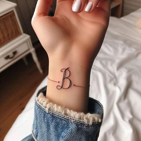 Wrist Letter Tattoo, Tattoo Ideas Female Wrist, Letter Tattoo Ideas, Letter Tattoo, Birthday Tattoo, Tattoo Name, The Letter A, Tattoo Ideas Female, Name Tattoos