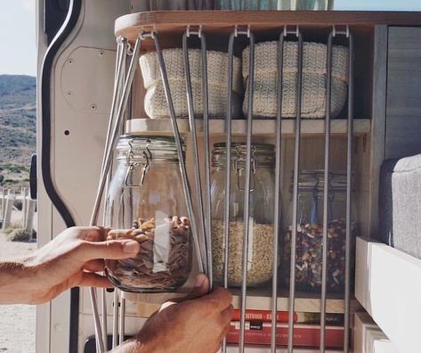 ProjectVanlife 🚐 on Instagram: “These band of elastic cords keep our storage jars from falling over. We've always been into functional furniture. 📸 by: @wander.horizons…” Campervan Storage Ideas, Campervan Storage, School Bus Tiny House, School Bus Camper, Van Storage, Kombi Home, Build A Camper Van, Van Life Diy, Build A Camper