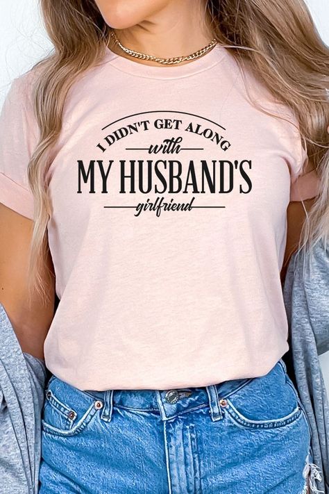 Looking for a relationship shirt that is not only trendy but witty at the same time? This “I Didn’t Get along with My Husband’s Girlfriend” is a uniquely designed T-Shirt. It's a statement piece and a great  conversation starter. This sarcastic tee is perfect for newly divorced, independent women. It is a top rated Bella Canvas 3001 tee that is a well-loved favorite with a modern fit. Click to shop this funny, divorce T-Shirt and browse the shop for many other funny and sarcastic shirts. Divorced Shirts For Women, Divorce Shirts Funny, Divorce Shirts For Women, Divorce Party Ideas Woman, Divorce Celebration, Women Party Ideas, Looking For A Relationship, Sarcastic Shirts Funny, Sarcastic Tees