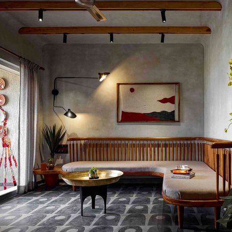 Find out how the designers used this entire Pune home as a canvas for Indian folk art | Architectural Digest India Earthy Materials, Modern Living Room Design Ideas, Modern Living Room Design, Luxury Sofa Design, Adjustable Wall Light, Indian Home Design, Unique Coffee Table, Ethnic Art, Indian Folk Art