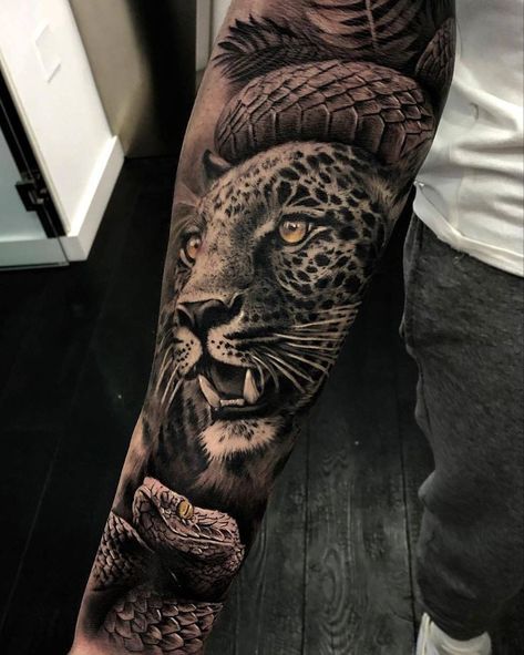 For similar reasons, the Leopard is also known to symbolize power and skills. When it comes to instincts nothing can beat the way that a Leopard can adapt and manipulate situations to work for their favor. Because of this, Leopards are also the symbol for cunningness and capability! #tattoo #tattoodesign #tattooing #leopard tattoos # tattoo ideas # modern leopard tattoos # inspirational leopard tattoo ideas # tattoo for animal lover # tattoo for men # tattoo for women # tattoo on shoulder Tattoo Leopard, Jungle Tattoo, Animal Tattoos For Men, Big Cat Tattoo, Jaguar Tattoo, Animal Sleeve Tattoo, Leopard Tattoos, Panther Tattoo, Forarm Tattoos