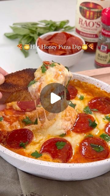 Rachaell Rampini on Instagram: "🍯Pizza dip with hot honey and pepperoni🍕I have been seeing pizza dip ALL over my feed. I don’t know who originally created the idea for this delicious dip, but oh my goodness. It is a great appetizer to bring to any gathering. Best part is you can prepare it ahead of time and pop it in the oven when you’re ready!

Pizza Dip with Pepperoni and Hot Honey
*full recipe can be found on my blog as well❤️🍕

8 oz cream cheese, room temp
1 cup sour cream, room temp
Sliced pepperoni (amount depends on size/shape of baking dish)
1 tsp dried basil
1/2 tsp dried oregano
1/2 tsp onion powder
1/2 tsp garlic powder
1 cup marinara
1 cup shredded mozzarella
1/4 cup grated Parmesan
1 tbsp hot honey
Parsley or basil to garnish (parsley stays fresh longer)

Preheat oven to 35 Pizza Dip With Cream Cheese, Pepperoni Pizza Dip, Crock Pot Dips, Pizza Dip, Cream Room, Chicken Pot Pie Soup, Dried Basil, Cream Cheese Dips, Hot Honey