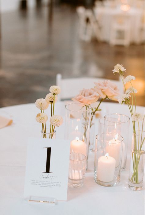 #wedding #weddingideas Minimal Floral Arrangements Wedding, Circle Table Arrangement Wedding, Single Flower And Candle Centerpiece, Simple Candle And Flower Centerpieces, Wedding Reception Circle Table Decor, Small Vases Centerpiece Wedding Round Table, Circle Table Bud Vases, Bud Vase And Tea Light Centerpiece, Bud Case And Candle Centerpiece