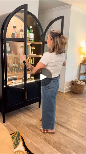 914K views · 34K reactions | Transforming a hutch into a chic bar station is easier than you think! 🍸✨ 

Found this beauty at Sam’s Club and added lights and wine glass holders for that perfect finishing touch. 

Who else loves getting creative with their pieces? Who has a hutch that doubles as a bar? 

Be sure to follow me @margiemargeclark for daily petite fashion and home decor inspo!

Find this hutch and all the elements on my LTK! | Maegan Clark | Hozier · Too Sweet Hutch Bar Ideas, Bar Unit For Home, Organize Clutter, Bar Hutch, Lakehouse Ideas, Open Floor House Plans, Bar Unit, Crockery Unit, All The Elements