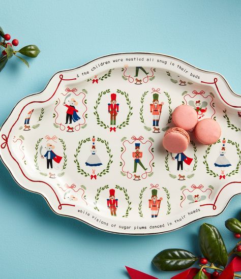 From Mud Pie, this Christmas platter features:The ceramic platter features a hand-painted fluted rim.CeramicWinter Wonderland CollectionHand-painted nutcracker detailScalloped rimHand washMeasure approx. 10.5" x 16.25"Imported. Nutcracker Christmas Party, Christmas Platter, Vintage Nutcrackers, Ceramic Platter, Holiday Feast, Christmas Dishes, Christmas Plates, Christmas Party Decorations, Nutcracker Christmas