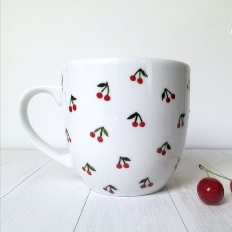 Hand painted coffee mugs with cherry pattern #porcelainpainting, #handpainted, #handpaintedmug, #mug, #fruits, #fruitpainting, #fruitpattern, #coffeemug, #teatime, #cup, #mugforgift, #giftidea, #summer, #summervibes, #cherry, #cherries, #mugwithcherries, #pebeo, #pebeoporcelaine150, #kubek, #kubeknaprezent, #owocowykubek, #kubeknazamówienie, #kubekręczniemalowany, #malowanaporcelana, #ręczniemalowane, #rękodzieło, #polskierękodzieło, #handmade, #wiśnie, #wisienki, #rękodzieło Cherry Pottery Painting, Easy Mug Painting, Coffee Cup Painting Ideas, Pottery Painting Ideas Easy Coffee Mugs, Hand Painted Pottery Mugs, Cherry Pottery, Mug Painting Ideas Easy, Hand Painted Mugs Ideas, Pottery Painting Easy