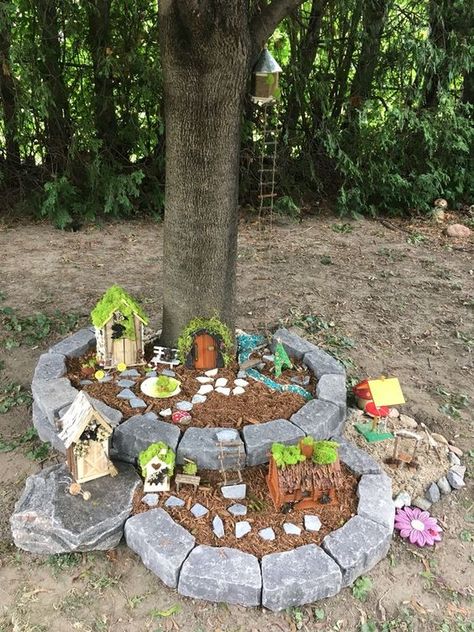 Fairy Garden Stone House Diy, Fairy Garden Neighborhood, Fairy Front Yard, Large Garden Ideas Landscaping Backyards, Tree Area Ideas, Fairy Garden In Backyard, Fairy Garden Ideas Around Tree, Fairy Garden Around A Tree, School Fairy Garden