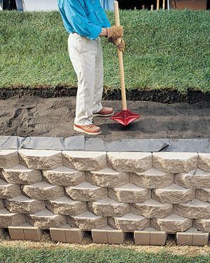 perforated drain tile Retention Wall, Decorative Retaining Walls, Diy Retaining Wall, Backyard Retaining Walls, Backyard Goals, Patio Decorations, Outdoor Makeover, Building A Retaining Wall, Yard Drainage