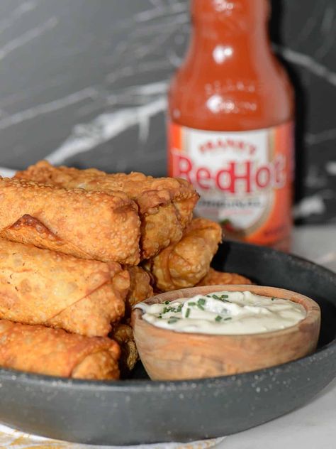 Buffalo Chicken Egg Rolls - Foodology Geek Buffalo Chicken Dip Egg Rolls, Buffalo Chicken Egg Rolls Fried, Buffalo Chicken Egg Rolls Air Fryer, Buffalo Egg Rolls, Franks Buffalo Chicken, Buffalo Chicken Eggrolls, Egg Roll Sauce, Buffalo Chicken Egg Rolls, Frozen Egg Rolls