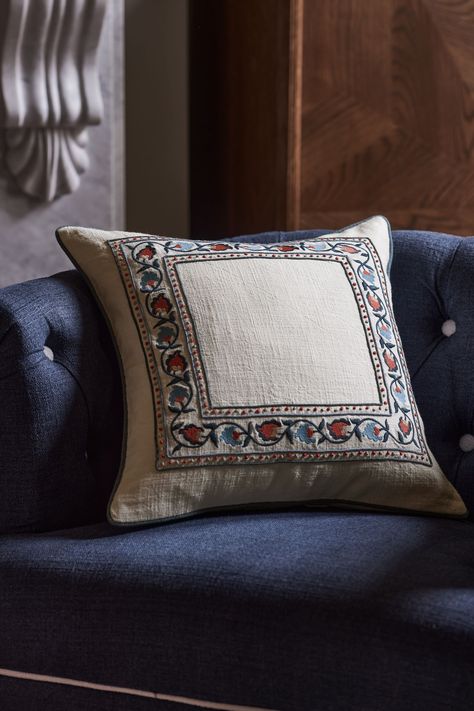 A layer of luxury for your living space, this Suzani cushion uplifts any setting. Crafted with an intricately embroidered floral design, this stunning piece is inspired by antique textile methods which  hail from Uzbekistan. Made from premium cotton slub, the gorgeous hues add a timeless and serene  feel to your space. Main 100% Cotton. Lining 100% Polyester. Manor Entrance, Embroidery On Pillow, Blue Hallway Ideas, Bed Setting, Cushion Arrangement, Embroidery Cushion, Cushion Embroidery, Product Styling, Nina Campbell