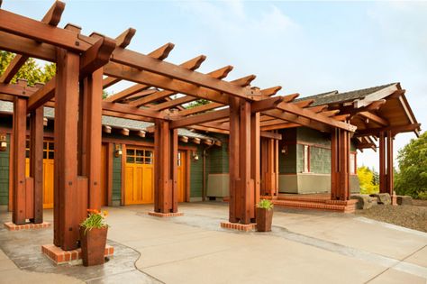 A series of redwood trellises creates a period-style pergola to screen the garage, which has new doors of cedar. Cabana Ideas, Cali House, Timber Joinery, Materials Board, Pergola Shade Cover, Garage Pergola, Steel Pergola, California Bungalow, Covered Walkway