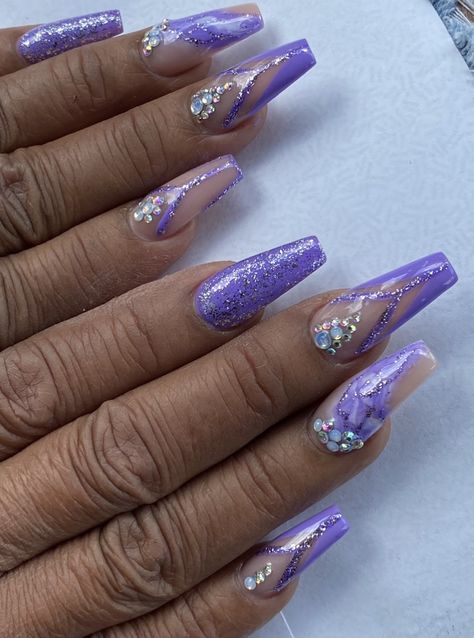 Lilac purple with purple glitter and rhinestones Purple Back To School Nails, Nails To Go With Purple Prom Dress, Purple And Silver Nail Ideas, Prom Nails Purple Lavender, Lilac And Silver Nails, Purple Nails With Gems, Purple And Silver Nails Coffin, Purple Jewel Nails, Prom Nails Lilac Silver Glitter