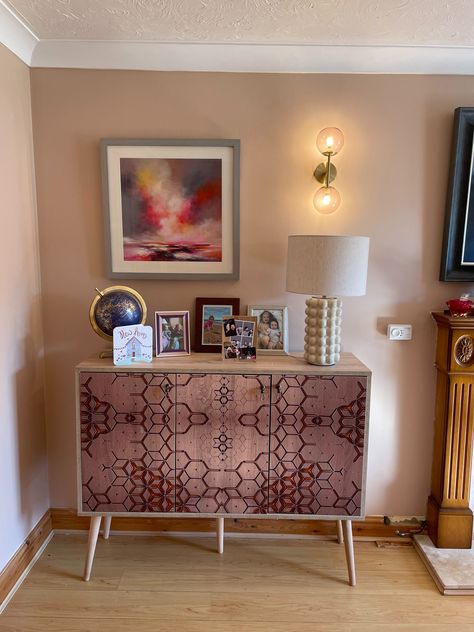 A mid century modern living room sideboard with a honeycomb pattern on the front against a wall painted in Setting Plaster by Farrow and Ball. Plaster Coloured Paint, Setting Plaster Farrow And Ball Living Rooms, Setting Plaster Living Room, Setting Plaster Farrow And Ball, Best Paint Brand, Heritage Paint Colours, Farrow And Ball Living Room, Plaster Paint, Dulux Paint