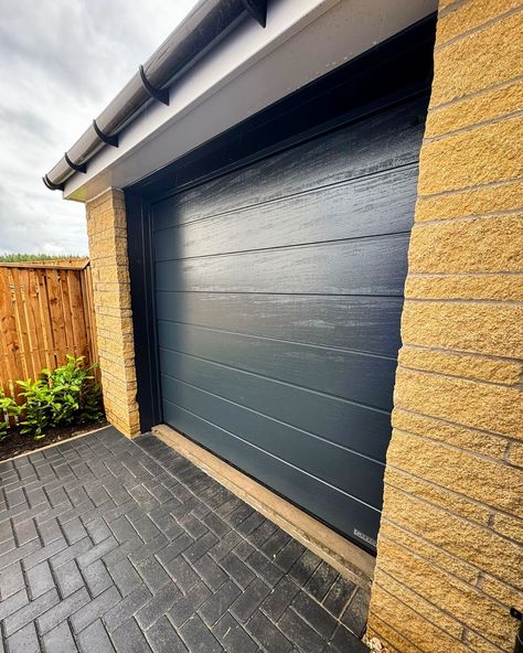 Beautiful Anthracite Sectional garage door install in Robroysto - what a transformation! 💫✨ #clydegaragedoors #garador #garagedoor #beforeandafter #garagedoorinstall #homereno #inspohome #garagedoors Dark Grey Garage Door, Grey Garage Door, Grey Garage Doors, Grey Garage, Roll Up Garage Door, Garage Door Parts, Custom Garage Doors, Sectional Garage Doors, Garage Door Types