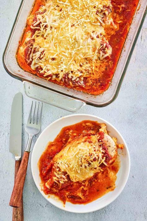 Baked Chicken Parmesan is a delicious Italian dinner to make any day. Get the easy recipe and find out how to make the best chicken parmesan baked in the oven. A simple and healthy casserole to dump and bake. No breading makes it gluten free and low carb. #chickenparmesan #chickenbreastrecipes #chickendinnerideas #easychickenrecipe Breaded Chicken Parmesan Recipe, Best Chicken Parmesan, Dump And Bake, Chicken Parmesan Recipe Baked, Oven Baked Chicken Parmesan, Healthy Casserole, Pasta Meals, Angel Fire, Chicken Breast Recipes Easy