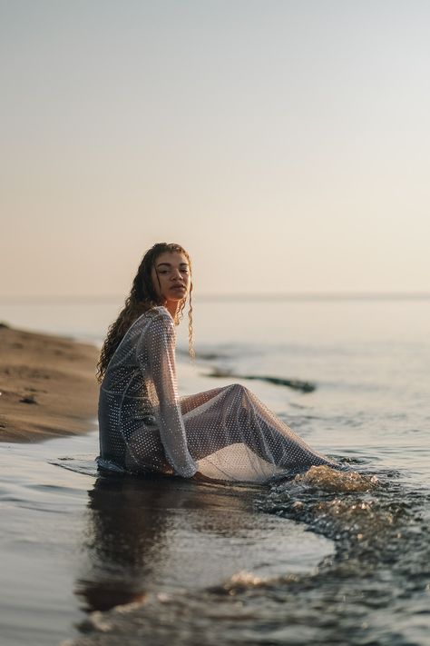 A sunrise beach editorial photoshoot for summer that is sure to inspire you and make you want to hit the beach at sunrise yourself! #fashioneditorial #editorialphotography #beacheditorial #sunrisephotoshoot #editorialpictures #photographyinspiration Sea Goddess Photoshoot, Editorial Water Photoshoot, Edgy Beach Photoshoot, In The Water Photoshoot, Photoshoot Ideas Sea, Water Shoot Ideas, Fashion Beach Photoshoot, Tropical Photoshoot Ideas, Beach Shoot Ideas Photoshoot