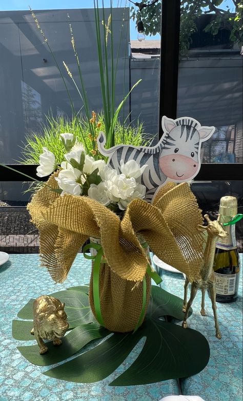 Wild One Centerpiece Ideas, Safari Floral Centerpieces, Safari Theme Floral Arrangements, Jungle Safari Centerpieces Ideas, Safari Theme Centerpieces Diy, Zoo Centerpieces, Safari Baby Shower Girl Centerpieces, Jungle Centerpieces Ideas, Safari Centerpiece Ideas