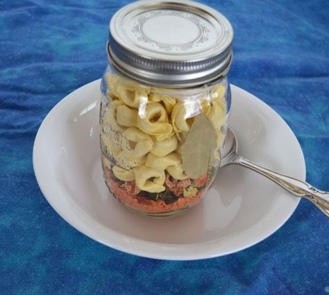 This Tortellini Soup Mix in a Jar makes a great gift anytime of the year. January is National Soup Month and we’ve been making soup and talking about soup all this month. Soup is a healthy, i… Vegan Soup Mix In A Jar, Soup Gift Basket, Jar Soups, Dry Soup Mixes, Gift In A Jar Ideas, Dry Soup Mix Recipes, Soup Mix In A Jar, Jar Soup, Jar Food Gifts