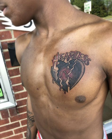 Small Hood Tattoos, Heartless Tattoo Men, No Love Tattoo Men, Half Chest Tattoo Men Ideas Unique, Explore Tattoo Ideas, Chest Tattoo Men Ideas Black Man, Black Male Tattoos, Half Chest Tattoo Men Ideas, Trap Tattoos Men