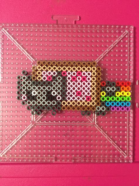 Small Nyan Cat perler beads done by BreAnda Robbins Cat Melty Beads, Nyan Cat Perler Beads, Small Pearler Beads, Small Perler Ideas, Small Perler Patterns, Perler Cat, Small Perler Beads, Small Perler Beads Ideas, Small Perler Bead Patterns