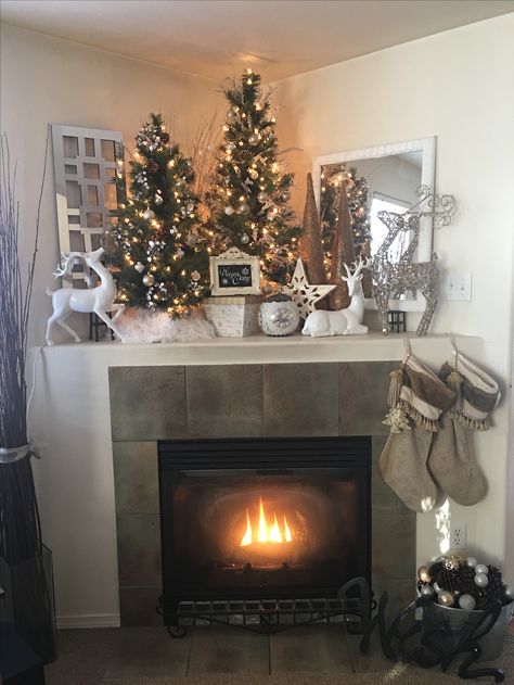 Warm and Cozy Corner Mantle Christmas Decor. Reindeer White Silver Gold Christmas Decor Corner Fireplace, Christmas Corner Fireplace Mantels, Corner Mantel Decor, Corner Fireplace Christmas Decorations, Corner Fireplace Mantel Decor, Christmas Corner Fireplace Decor, Corner Mantle Christmas Decor, Christmas Corner Mantle Decor, Corner Mantle Ideas