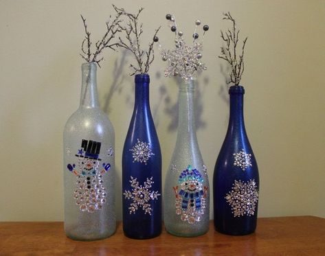 As you prepare to dress your home for the holidays, get festive by creating winter wonderland themed decorations, by re-purposing your leftover wine bottles. I love these snowman & snowflake holiday decorations, they're just creative & fun! For winter wonderland designs, I like to use the blue wine bottles for colorful contrast to create sparkly designs on top of. Snowman Craft Ideas, Holiday Wine Bottle Crafts, Creative Snowman, Snowman Wine Bottle, Holiday Wine Bottles, Blue Wine Bottles, Snowman Crafts Diy, Wine Bottle Centerpieces, Wedding Wine Bottles