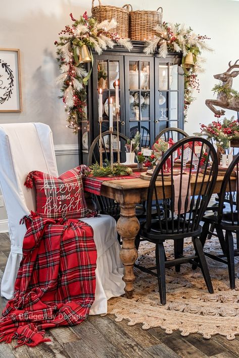 Love this cozy, festive holiday table set with favorite finds found in our holiday-influenced collection, A MERRY PLAID BRUNCH. So festive, so pretty!⁠ #homedecor #christmasdecor Top Of Hutch Christmas Decor, Farmhouse Christmas Dining Table Decor, Christmas Dining Room Ideas, Christmas Terrace, Dining Table Christmas Decor, Christmas Chairs, Christian Decorations, Christmas Tables, Christmas Dining Table Decor