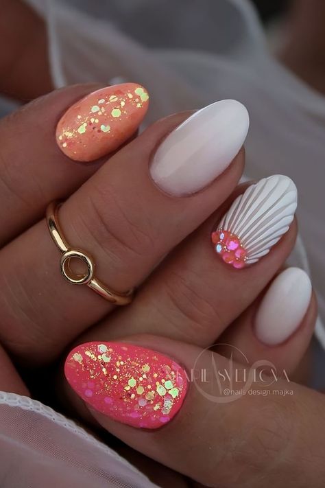 A trip to the nail salon isn’t cheap. You need to spend a lot of time and money there, so don’t let… Tropical Nails Dip Powder, Seashell Nail Design, Bahama Nails Beach, Multicolor Summer Nails, Holiday Nails Summer 2023 Short, Mermaid Nails Design Simple, Glittery Summer Nails, Nail Art Printemps 2023, Tropical Gel Nails