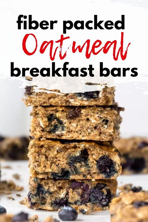 Nutritious, easy and slightly sweet, these oatmeal breakfast bars are full of fiber and packed with fresh blueberries. Make a batch in under 30 minutes to prep a week’s worth of grab and go breakfasts. These bars are made with whole wheat flour, rolled oats and flax seed, so they are packed with fiber to keep you feeling full. They are lightly sweetened with maple syrup and flavored with vanilla extract, cinnamon and juicy blueberries. This may be my favorite breakfast recipe yet! Fiber Oatmeal Cookies, Grain Free Breakfast Bars, Whole Grain Rolled Oats Recipes, Blueberry Oatmeal Breakfast Bars Healthy, High Fiber Oatmeal Bars, Oatmeal Breakfast Bars Healthy Protein, High Fiber Granola Bars, Fiber Bars Homemade, Diy Fiber Bars