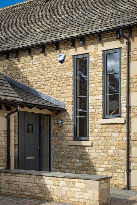 The Gold Stone project is a set of new-build homes just around the corner from us in the Cotswolds. Naturally, we were very pleased when we were chosen to supply and install their Scandinavian windows and doors. The architect chose the non-standard RAL7012 Basalt Grey to complement the golden Cotswold stonework from the initial design. This makes a welcome change from the more popular choice of anthracite grey, and it really gives the homes a ‘premium feel’ on the outside. Scandinavian Windows, Anthracite Grey Windows, Scandinavian Window, Barn Conversion Interiors, Lounge Room Design, Cottage Windows, Grey Windows, Initial Design, Window Color