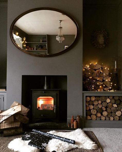 All for these cosy nights by the fire — especially against a backdrop of #MolesBreath, a moody grey. #FarrowandBall 📷 by… Farrow And Ball Moles Breath, Paint Farrow And Ball, Moles Breath, Farrow And Ball Living Room, Log Burner Living Room, Snug Room, Dark Living Rooms, Cosy Living Room, Living Room Color Schemes