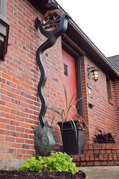 Downspout | Backyard | Pinterest Decorative Downspouts, Soil And Water Conservation, Rain Chains, Rain Chain, Water Collection, Rain Barrel, Front House Landscaping, Rain Water Collection, Rain Garden