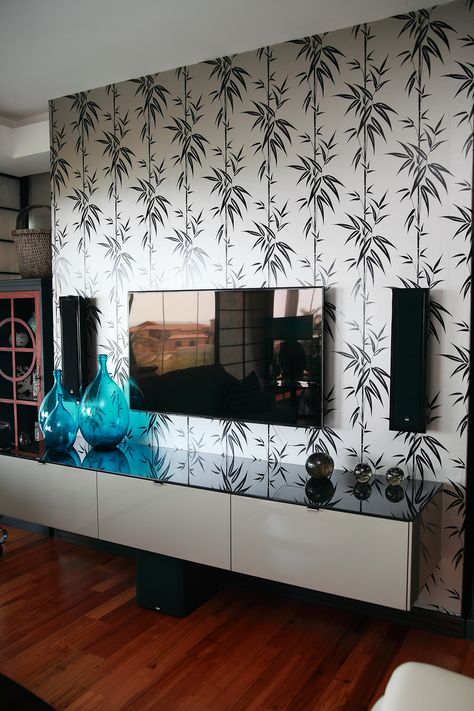 TV room create a backdrop behind the TV unit. #wallsdirect Tv Units With Wallpaper, Tv Background Wall Painting Ideas, Wallpaper Tv Unit Tv Walls, Tv Unit Wall Texture Paint, Tv Unit Wall Painting Ideas, Tv Unit Design With Wallpaper, Tv Unit With Wallpaper, Tv Unit Wallpaper, Wallpaper Behind Tv