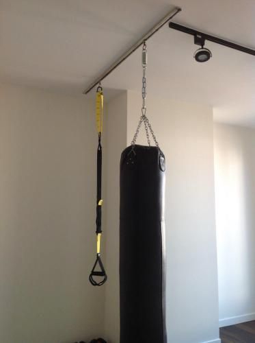 TRX & Heavy bag Mount Small Gym Room, Heavy Bag Mount, Gym Room Ideas, Studio Gym, Home Gym Basement, Trx Suspension Training, Trx Suspension, Gym Garage, Home Gym Garage