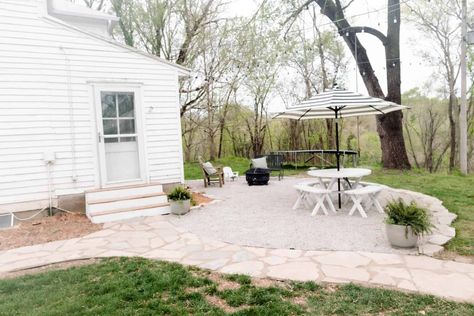 Learn how to build a pea gravel patio that is not only beautiful, but also an inexpensive way to enjoy your yard all season long. #farmhouseonboone #DIYpatio #peagravelpatio Gravel Patio Ideas, Basement Patio, Pea Stone, Farmhouse On Boone, Patio Farmhouse, Pea Gravel Patio, Gallery Wall Staircase, French Patio, Faux Fireplace Diy