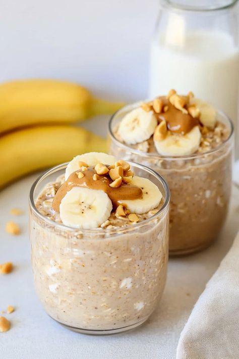 Discover the perfect breakfast recipe with these delicious banana peanut butter overnight oats. Easy to prepare ahead of time, this creamy and nutritious meal is a great way to kickstart your day. Simply mix oats, milk, yogurt, mashed bananas, and a dollop of peanut butter in a jar or container before refrigerating overnight. In the morning, you'll be greeted by a flavorful and satisfying breakfast option that will keep you energized throughout the day. Peanut Butter Jar Overnight Oats, Oat Milk Recipes, Banana Peanut Butter Overnight Oats, Butter In A Jar, Overnight Oats Easy, Peanut Butter Banana Overnight Oats, Oats Milk, Overnight Oats In A Jar, Oat Milk Recipe