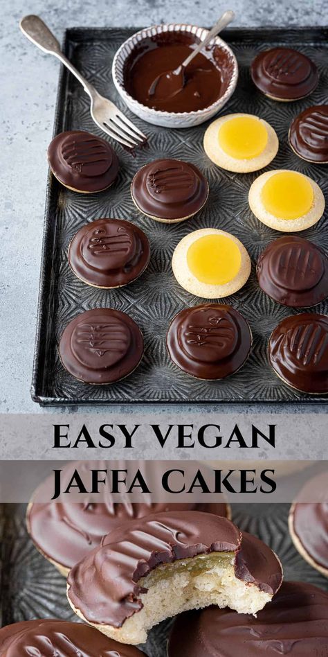 Vegan jaffa cakes - fluffy sponge cake topped with orange jelly and coated in chocolate. This vegan version of the classic British cake/biscuit is easy to make and so tasty! There is no need for anyone to miss out on these iconic treats with my eggless and dairy-free recipe! Afternoon Tea Cakes Recipes, Vegan Tea Cakes, Vegan British Recipes, Vegan British Desserts, Jaffa Cakes Recipe, Vegan Battenberg Cake, Vegan Sponge Cake, Vegan Jaffa Cake Recipe, Jaffa Cake Recipe