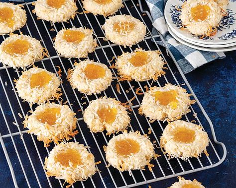 These piña colada-inspired goodies are a true delight. Pineapple-Coconut Thumbprint Cookies   Save Recipe Print Makes About 25 Ingredients 1 cup unsalted butter, softened ⅔ cup sugar 1 large egg, room temperature 1 teaspoon vanilla extract ¼ teaspoon coconut extract 2⅔ cups all-purpose flour ¾ teaspoon kosher salt ¼ teaspoon baking powder 1¾ cups sweetened … Pineapple Cookies, Coconut Extract, Coconut Snowballs, Pineapple Desserts, Coconut Dream, Snowball Cookies, Pineapple Coconut, Thumbprint Cookies, Xmas Cookies