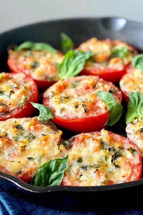 Mozzarella and Basil Stuffed Tomatoes! Whether you’re looking for new ways to use the abundance of summer tomatoes or simply want a quick side dish, these vegetarian stuffed tomatoes filled with mozzarella, parmesan, and fresh herbs are simple and delicious. #simplyrecipes #stuffedtomato #basil #vegetarianrecipe #vegetarian #sidedish #tomatoes #tomatorecipe Grilled Stuffed Tomatoes, Stuffed Tomatoes Recipes Vegetarian, Grilled Tomatoes With Parmesan, Grilled Tomatoes With Mozzarella, Tomatoes With Mozzarella And Basil, Tomatoes Mozzarella Basil, Side Dishes With Basil, Stuff Tomatoes Recipes, Stuffed Tomatoes Recipes Baked