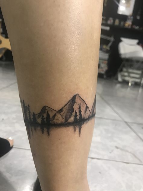 Mountain tattoo Ankle Tattoo Men, Berg Tattoo, Arm Wrap Tattoo, Tattoo Mountain, Grandma Tattoos, Wrap Around Tattoo, Wrap Tattoo, M Tattoos, Men Tattoos Arm Sleeve