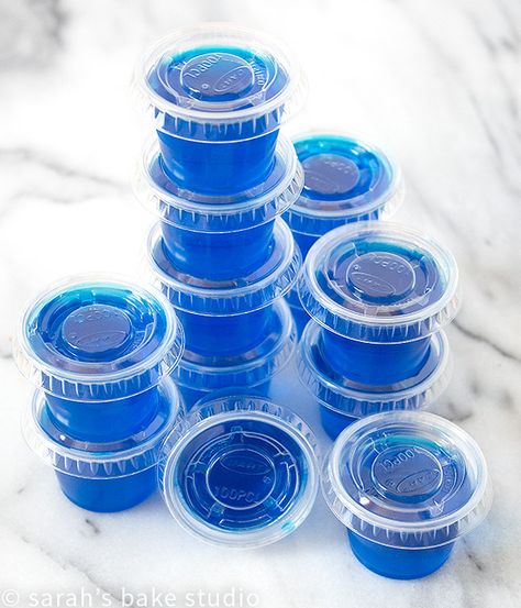 Blue Hawaiian Jello Shots – colorful, wiggly-jiggly, flavorful jello combined with tropical booze makes these jello shots scream SUMMER; grab your friends and make your taste buds sing. Smirnoff Red White And Berry Jello Shots, Raspberry Jello Shots, Summer Jello Shots, Blue Hawaiian Jello Shots, Pina Colada Jello Shots, Blue Jello Shots, Making Jello Shots, Jello Shooters, Halloween Jello Shots