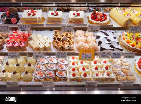 Download this stock image: Cakes and pastries on a display at a Japanese bakery. Tokyo, Japan. - E034AW from Alamy's library of millions of high resolution stock photos, illustrations and vectors. Cinnamon Swirl Cake, Lemon Cupcake Recipe, Japanese Bakery, Cream Cheese Sugar Cookies, Pastry Display, Banana Bread Cookies, Bakery Interior, Cakes And Pastries, Almond Butter Cookies