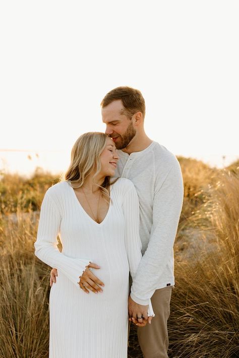 Sunset Maternity Session on the beach in Tampa Florida Diy Maternity Photos, Maternity Photography Poses Outdoors, Milk Bath Maternity, Fall Photo Shoot Outfits, Streetwear Coat, Maternity Photography Poses Pregnancy Pics, Maternity Photography Outdoors, Couple Pregnancy Photoshoot, Baby Announcement Pictures