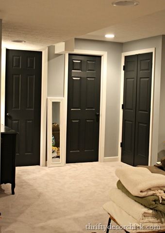 Black interior doors,  white trim through out house,  grey walls, white trim hall bathroom How To Paint Interior Doors, Paint Doors Black, Painting Interior Doors Black, Painted Interior Doors, Black Interior Doors, Thrifty Decor Chick, Black Doors, A Living Room, Interior Doors