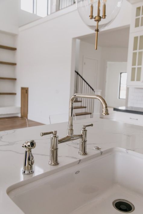 BECKI OWENS- Villa Bonita Kitchen Reveal! White and wood kitchen, mix metals, Brizo Artesso Bridge Faucet. Brizo Artesso Bridge Faucet, Brizo Kitchen Faucet, Brizo Bathroom Faucet, Waterworks Kitchen, Bridge Faucet Kitchen, Kitchen 2022, Bridge Kitchen Faucet, Bridge Faucet, Modern White Bathroom